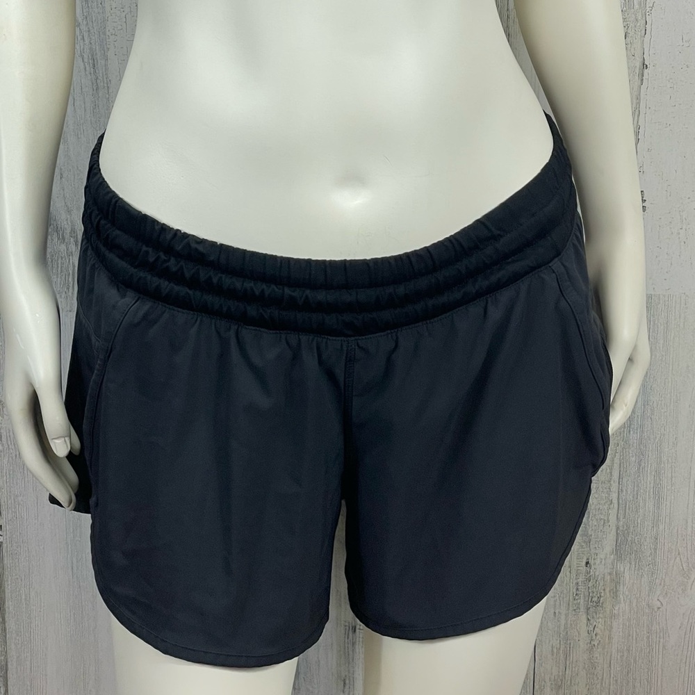 Lulu Lemon Athletic shorts woman’s size Medium/8. Black light weight with pocket